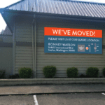 a sign outside of BONNEY WATSON saying, "We've Moved"